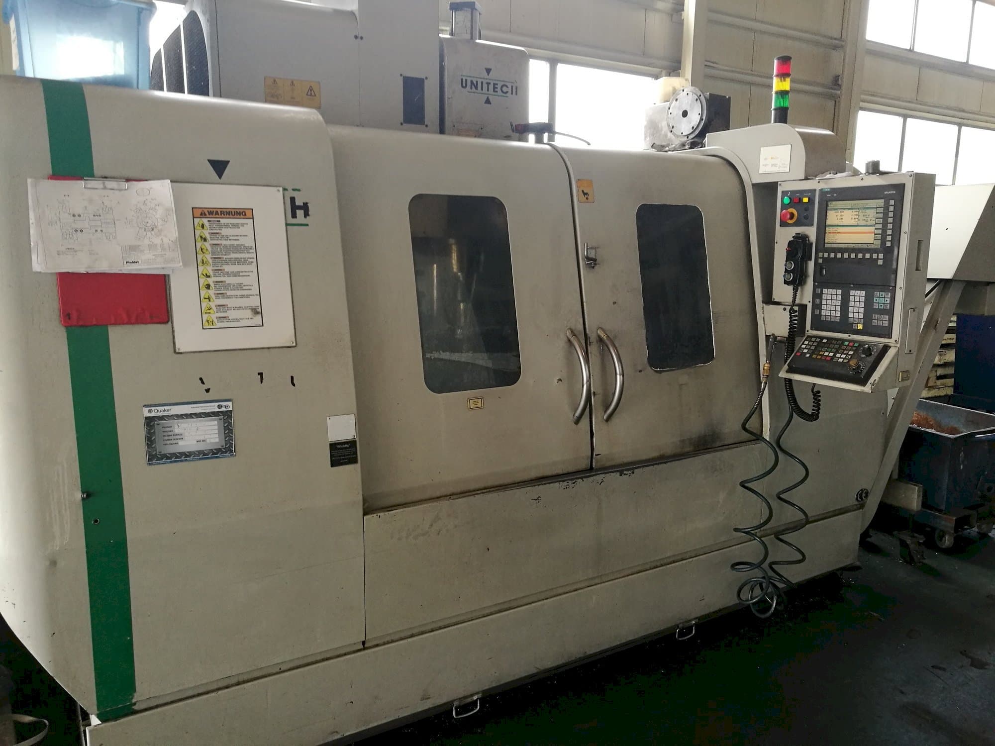 Masina UNITECH VMC-1250P3   eestvaade