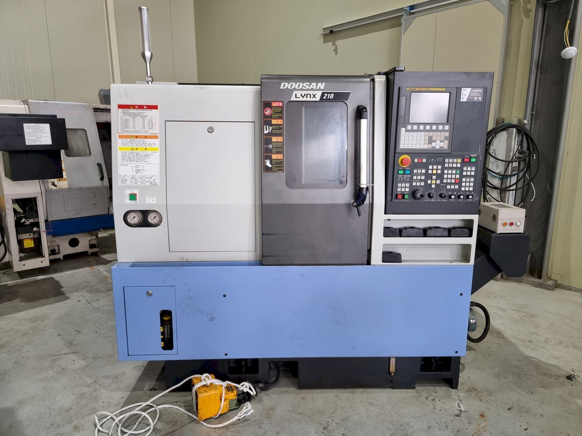 Masina Doosan LYNX 210   eestvaade