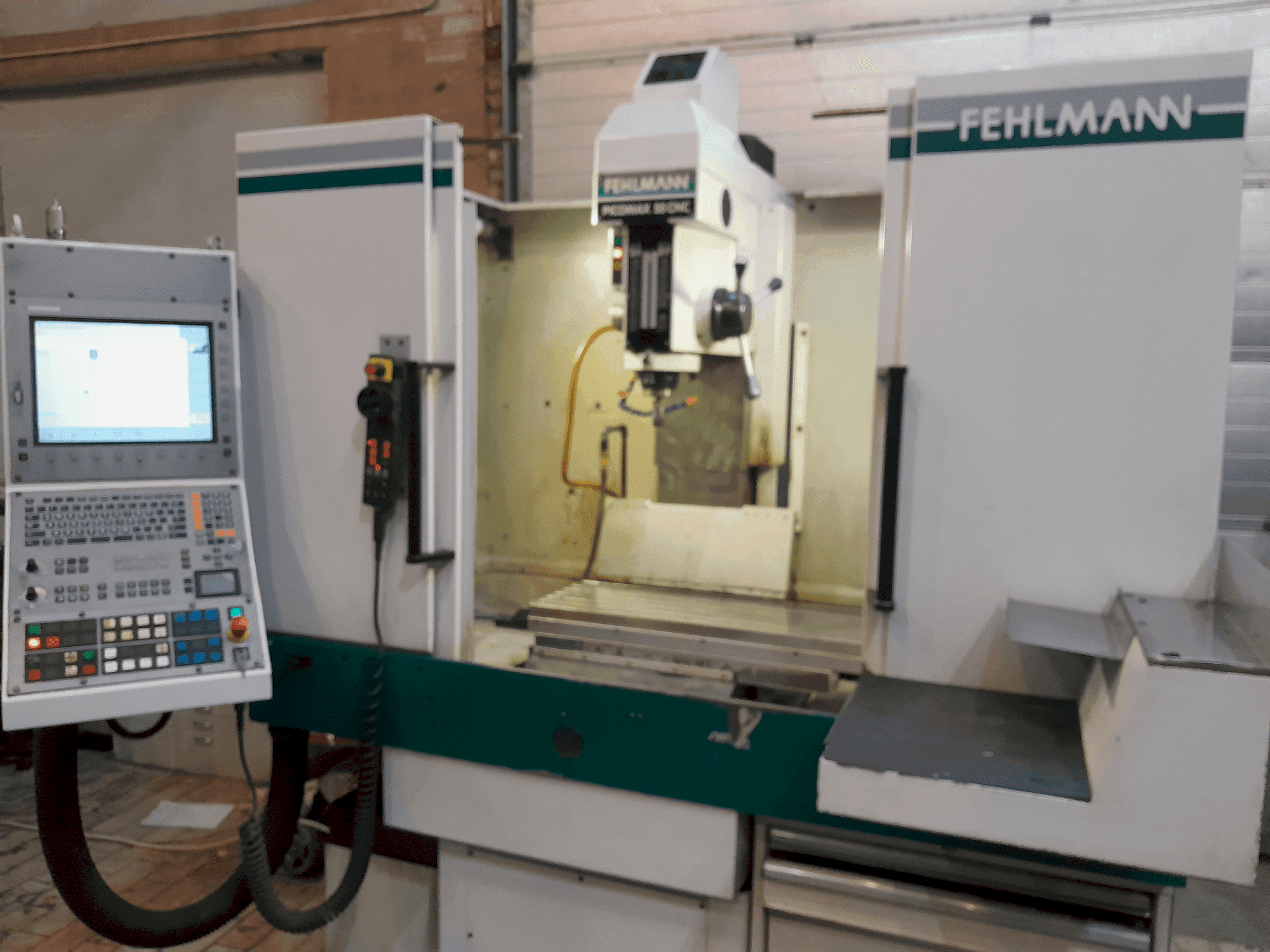 Masina FEHLMANN PICOMAX 55 CNC 2/3   eestvaade