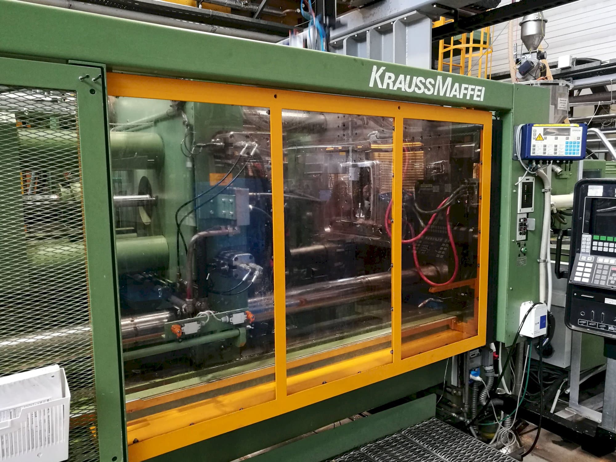 Masinavaade Krauss Maffei 650-2300 B2   vasakult