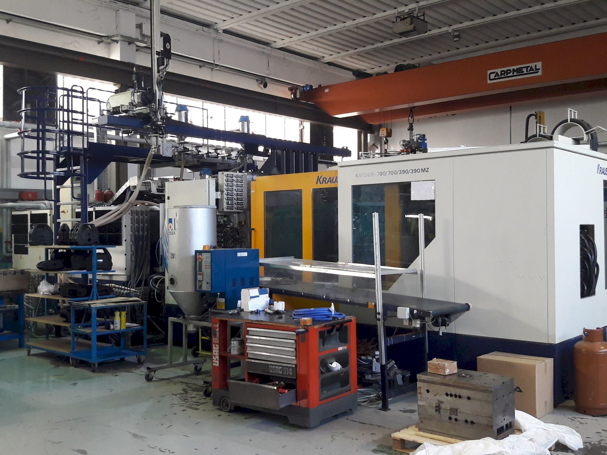 Masina Krauss Maffei 1300-700-700-390-390 MZ   eestvaade