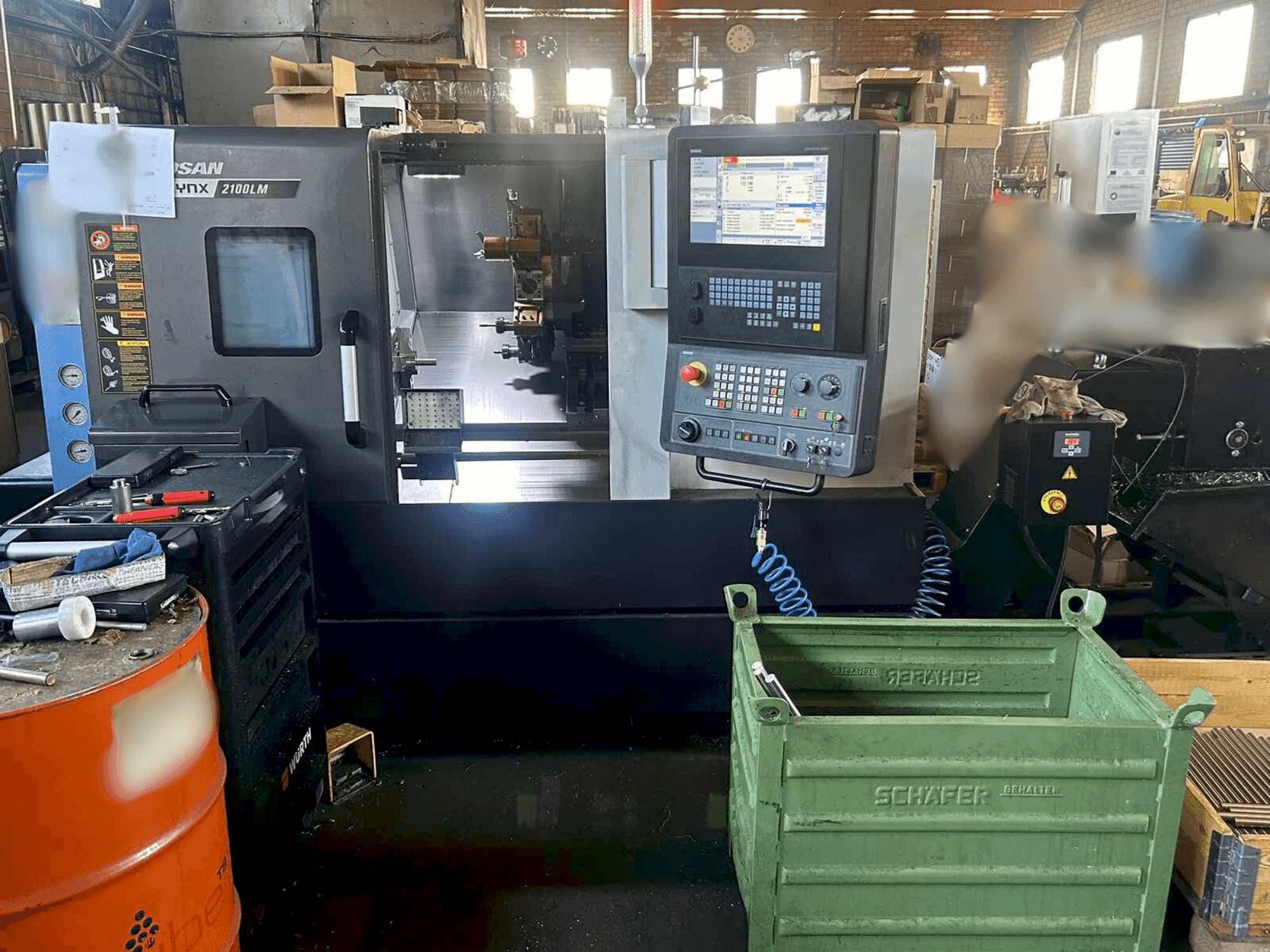 Masina DOOSAN LYNX 2100 LMB   eestvaade