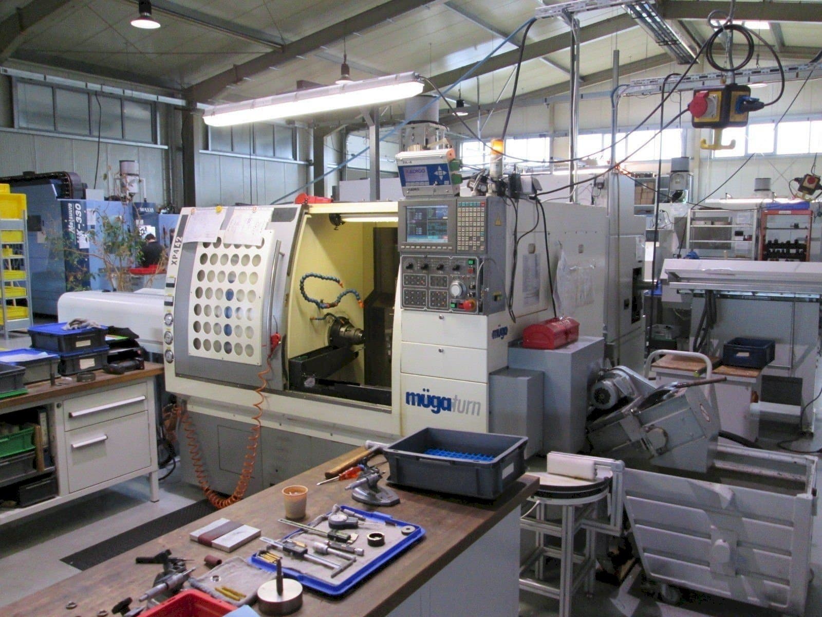 Masina Muga XP4 – 42SM   eestvaade