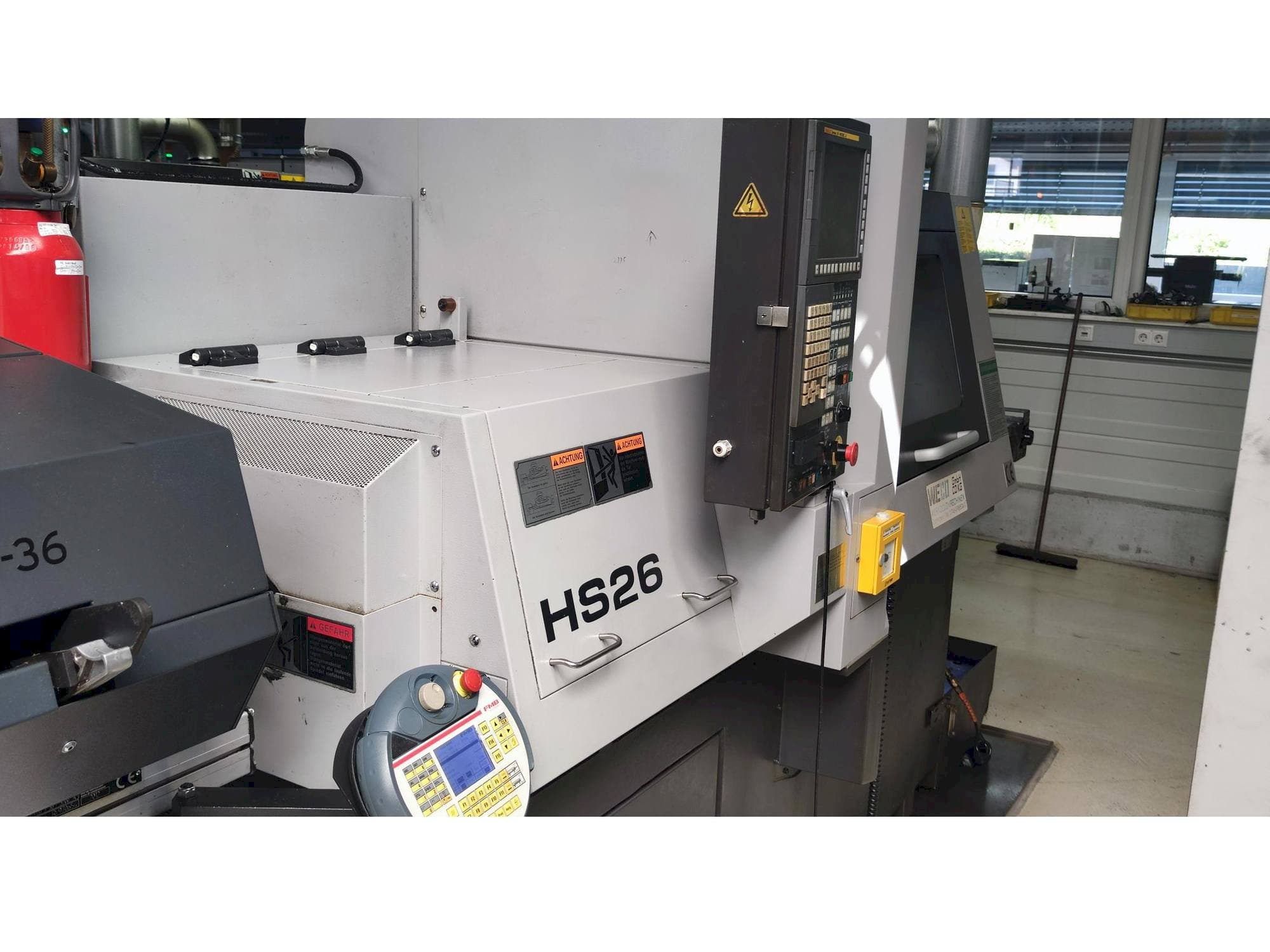 Masina TSUGAMI HS26   vasaku külje vaade