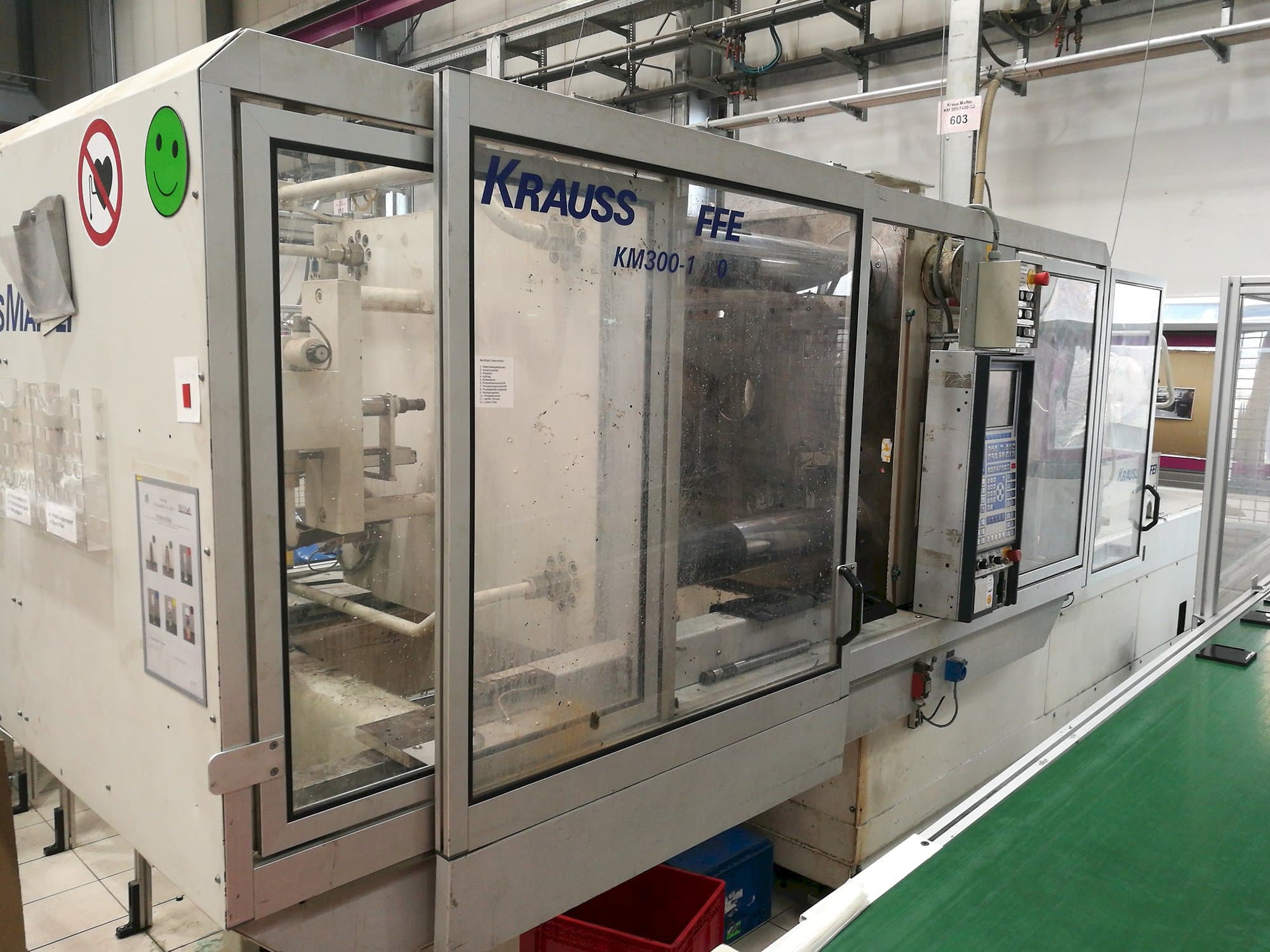 Masinavaade Krauss Maffei KM 300-1400 C2  vasakult