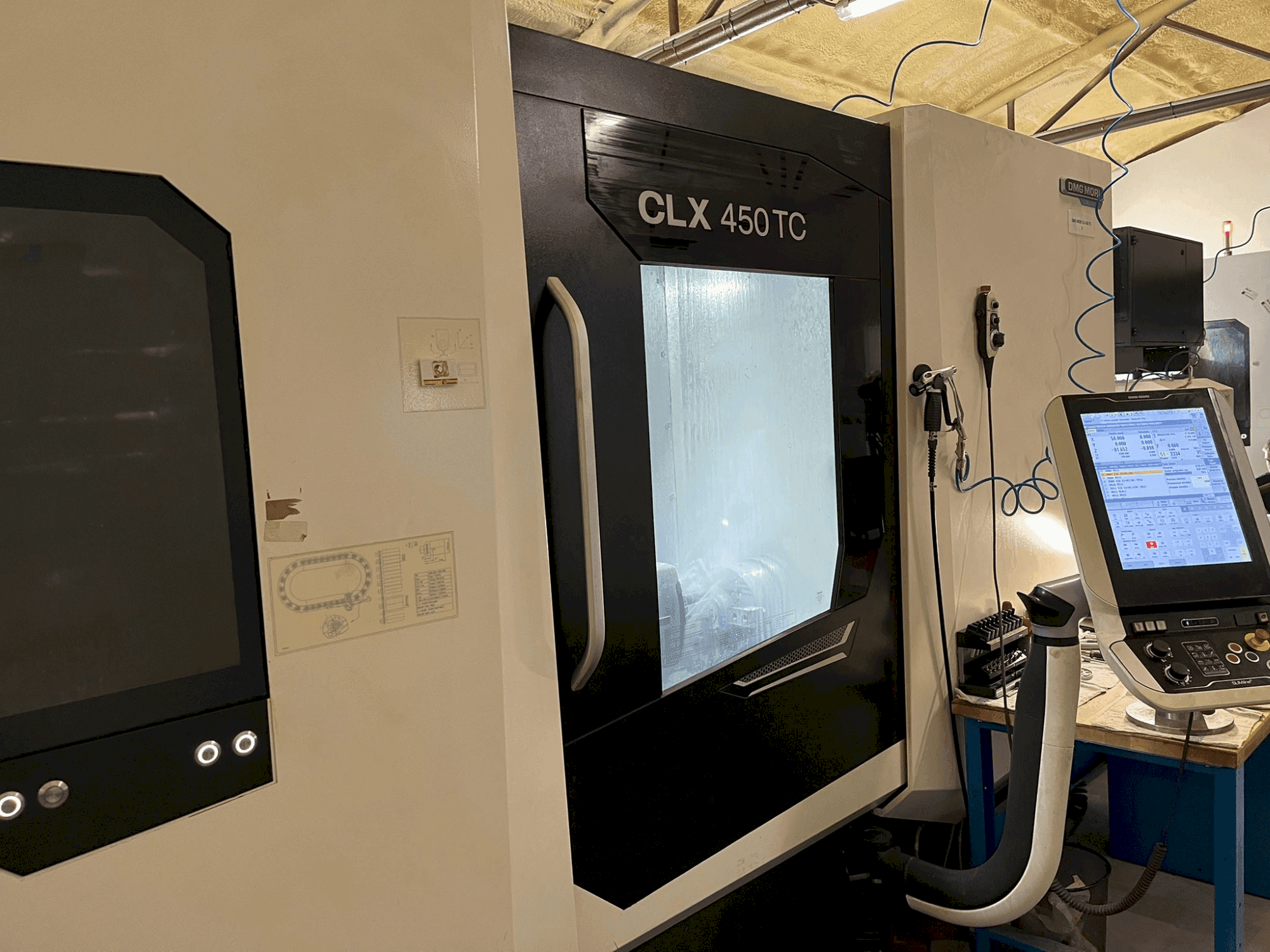 Masina DMG MORI CLX 450 TC   eestvaade