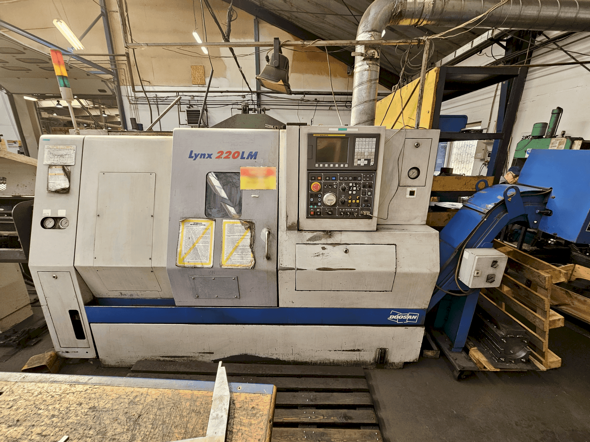 Masina DOOSAN LYNX 220LMA   eestvaade