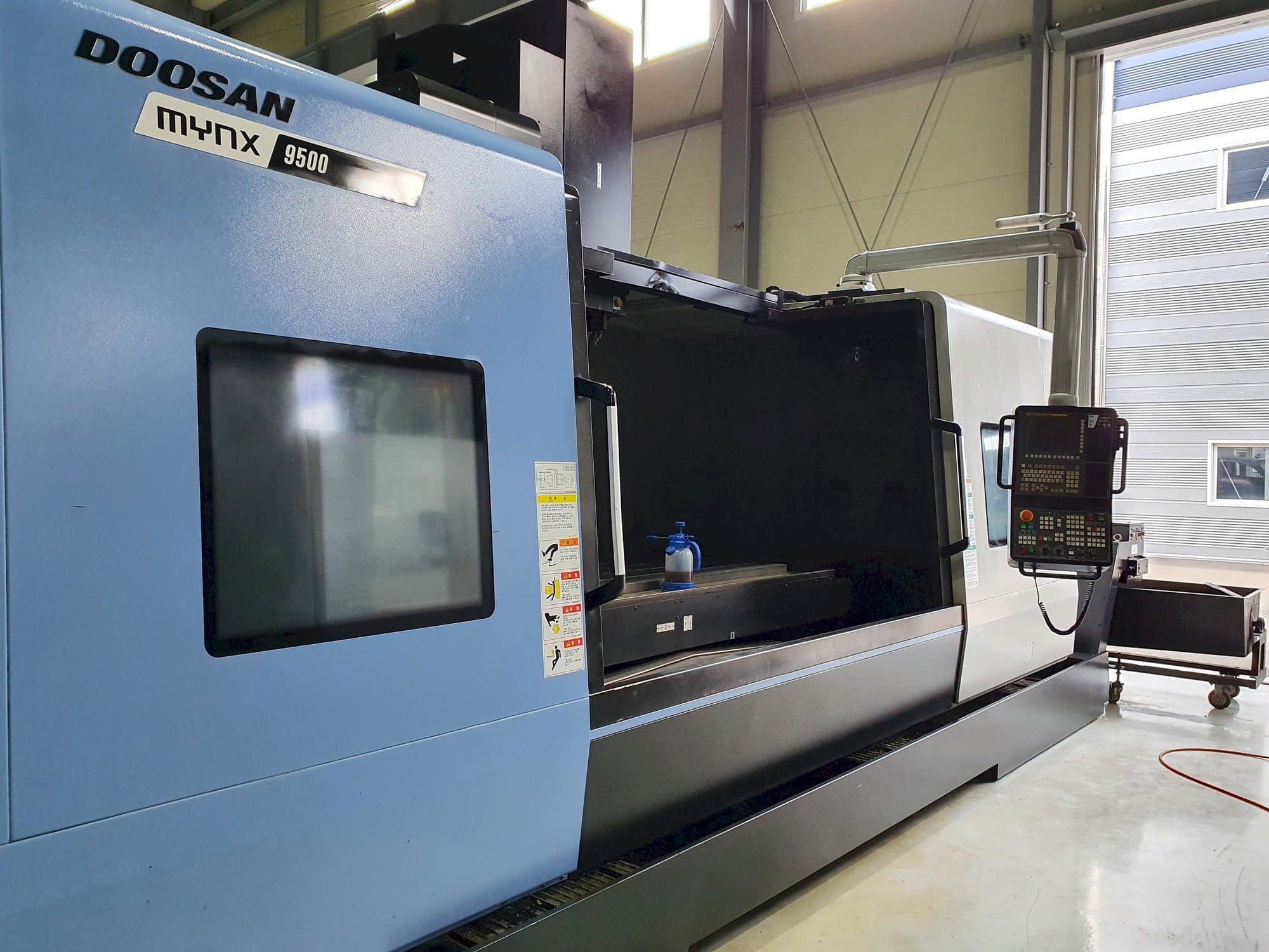 Masina Doosan MYNX 9500   eestvaade