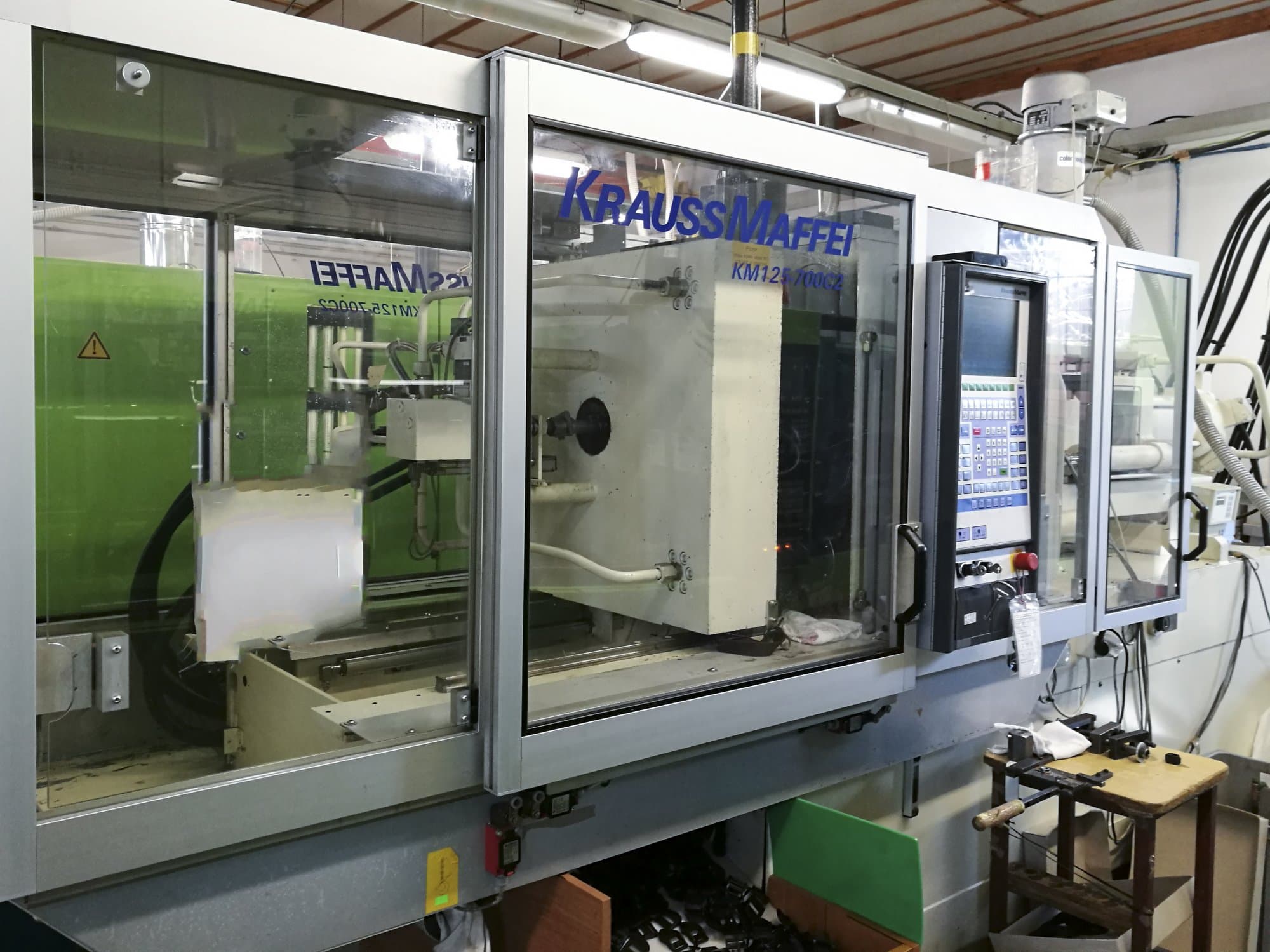 Masinavaade Krauss Maffei 125-700 C2   vasakult