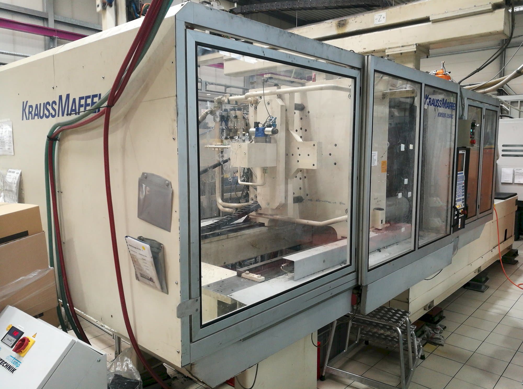 Masinavaade Krauss Maffei KM 500-3500 C1  vasakult