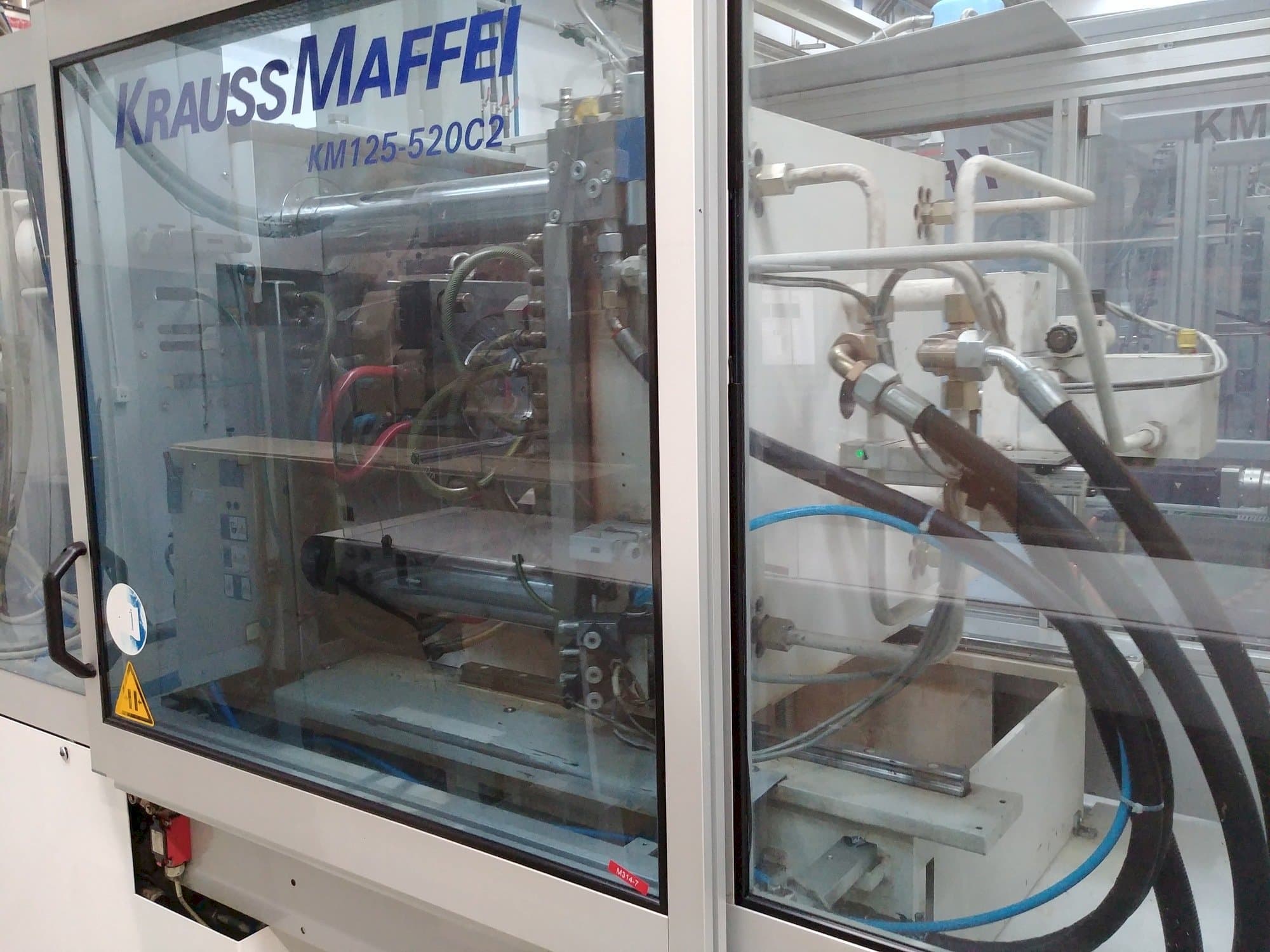 Masinavaade Krauss Maffei KM 125-520 C2   vasakult