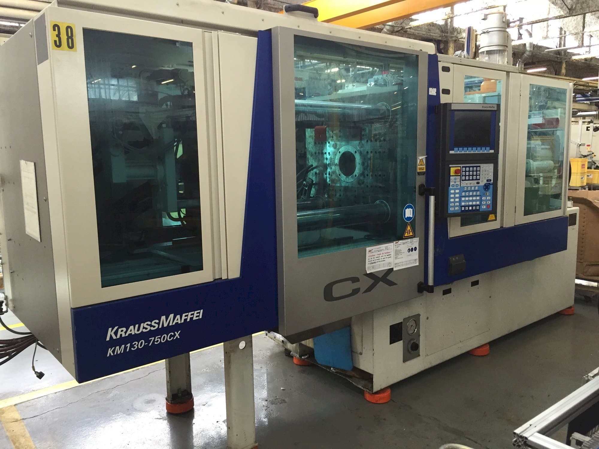 Masina Krauss Maffei 130-750 CX   eestvaade
