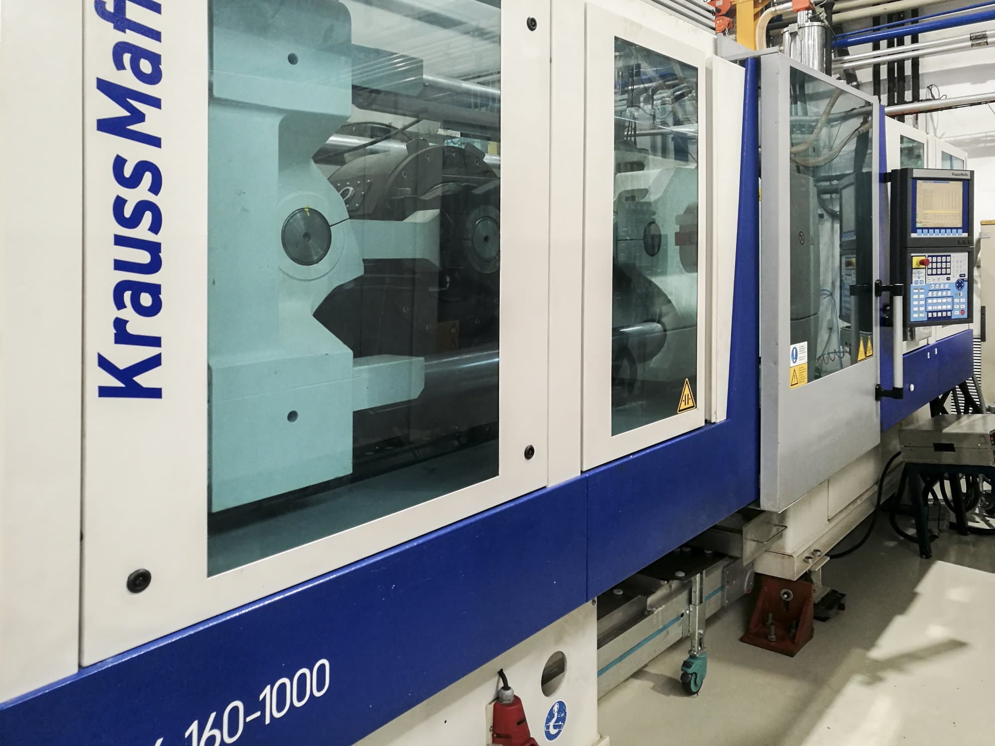 Masinavaade Krauss Maffei 160-1000 EX   vasakult