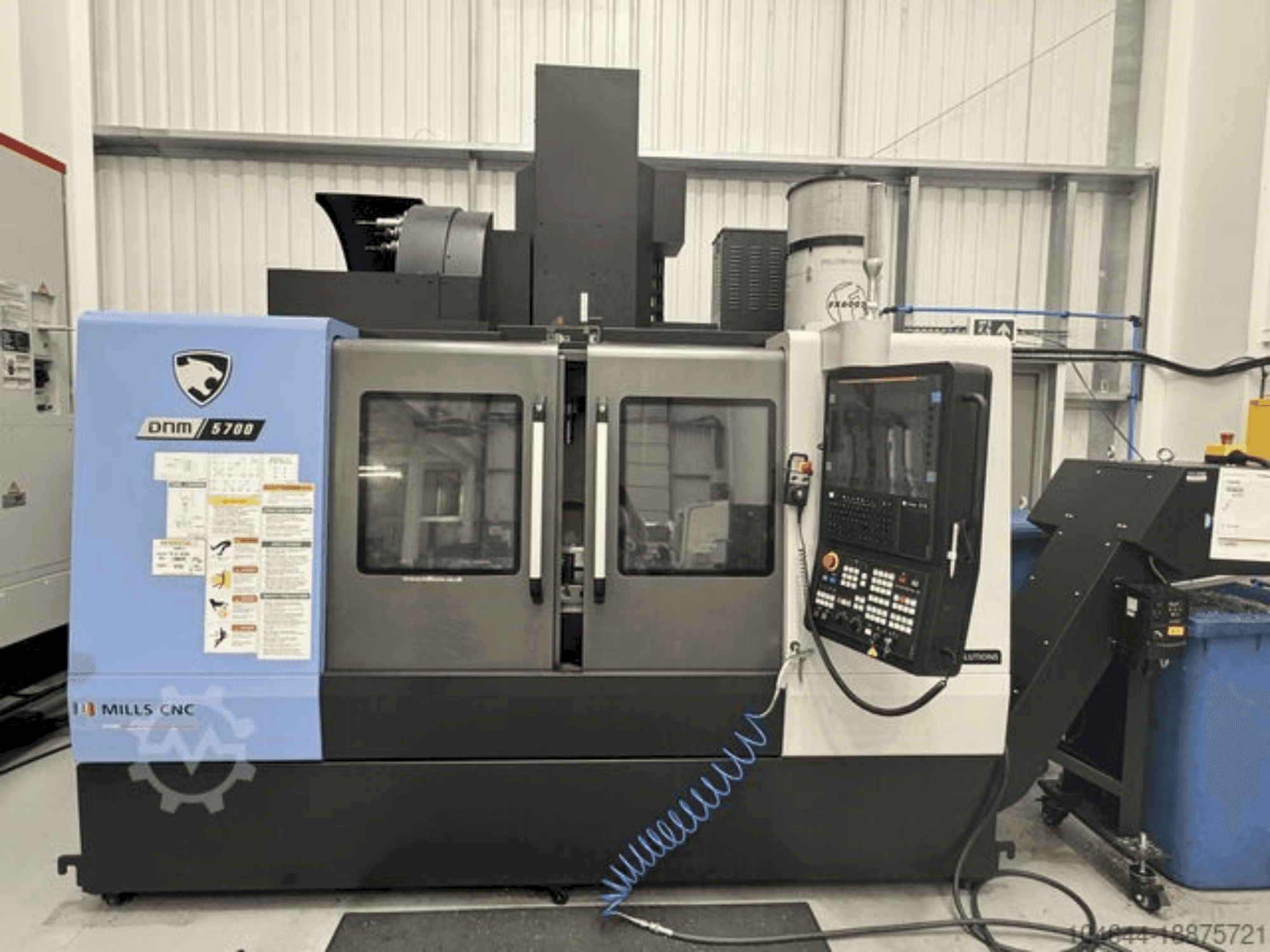 Masina DOOSAN DNM 5700 eestvaade