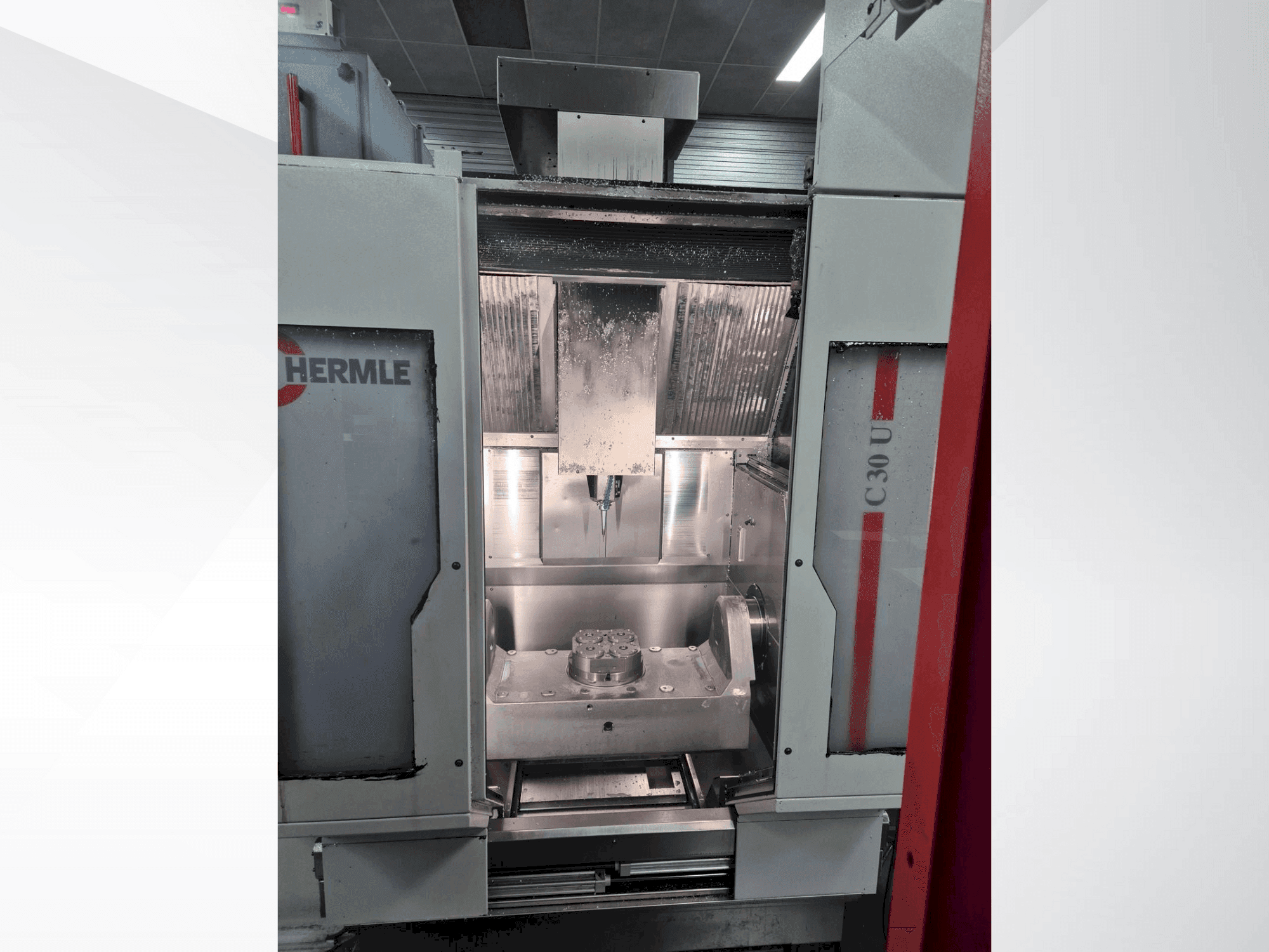 Masina HERMLE C30U + RS Automation eestvaade