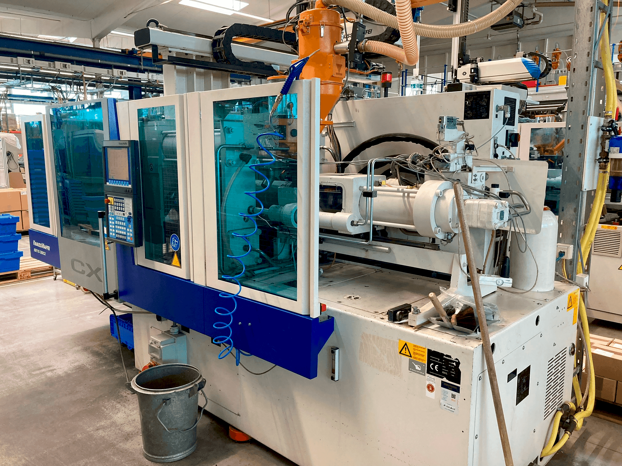 Masina Krauss Maffei 110–380 CX eestvaade