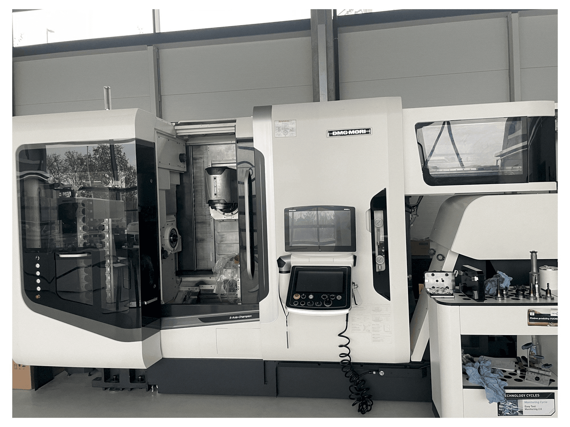 Masina DMG MORI NTX 1000 eestvaade
