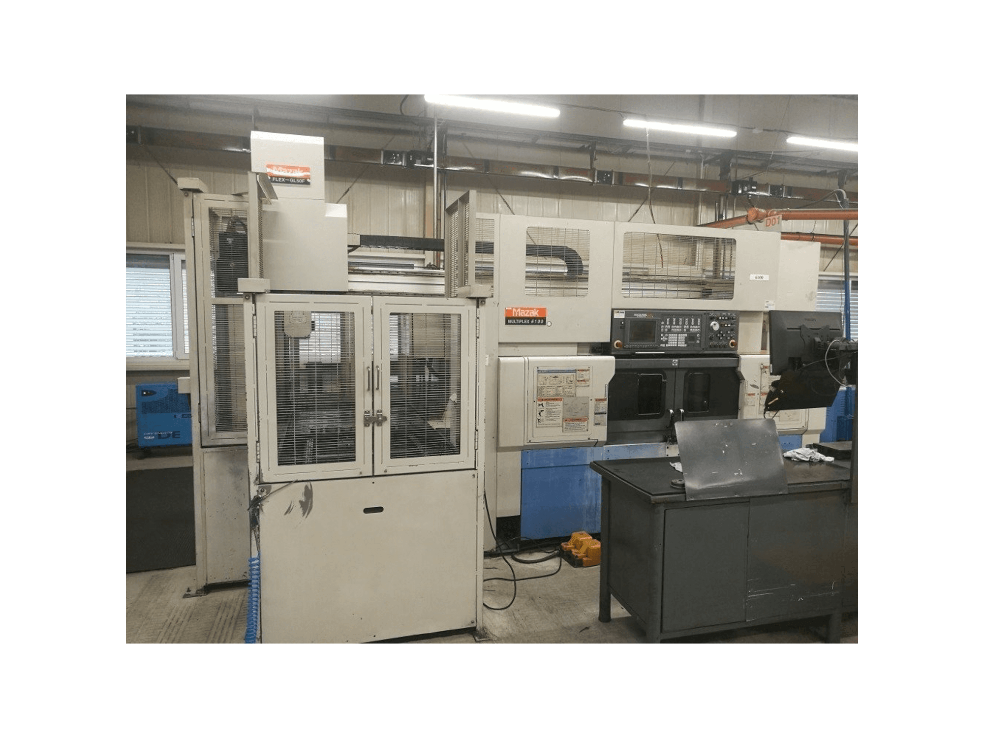 Masina Mazak Multiplex 6100 + robot FLEX-GL50F eestvaade