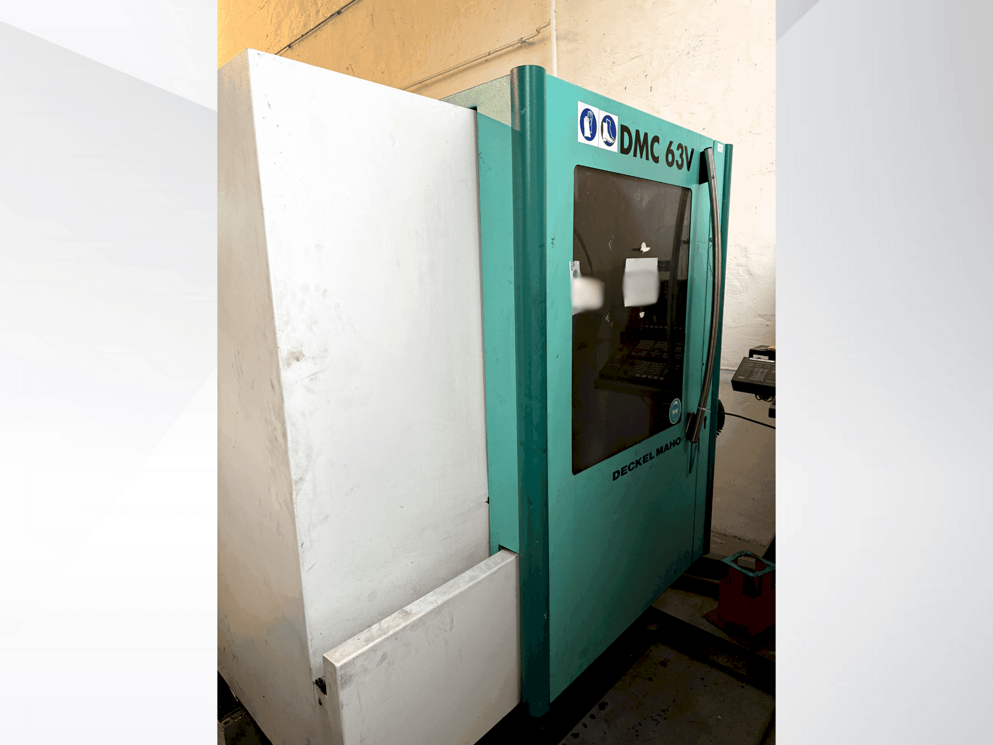 Masina DMG MORI Deckel Maho 63V eestvaade