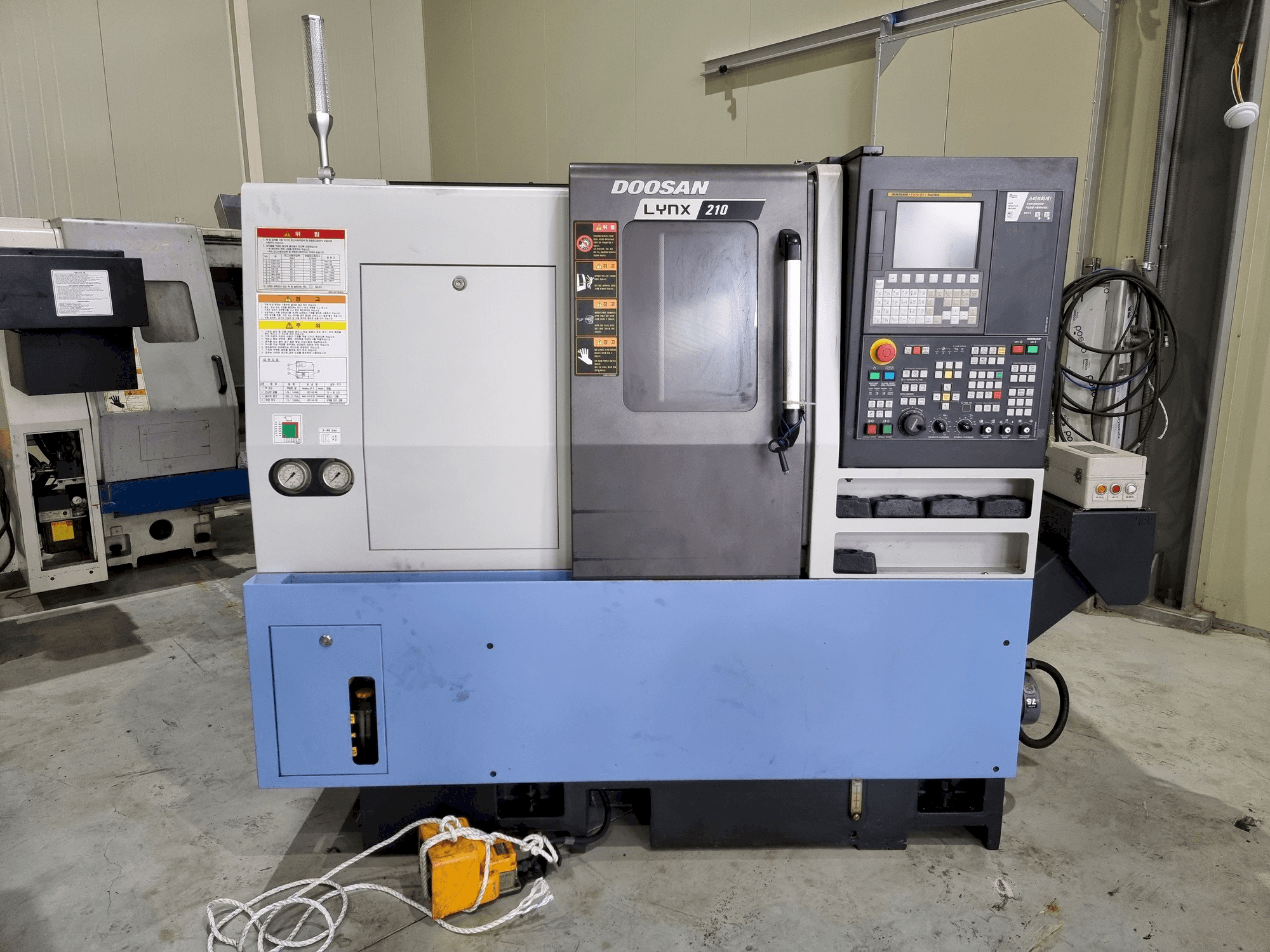 Masina Doosan LYNX 210 eestvaade