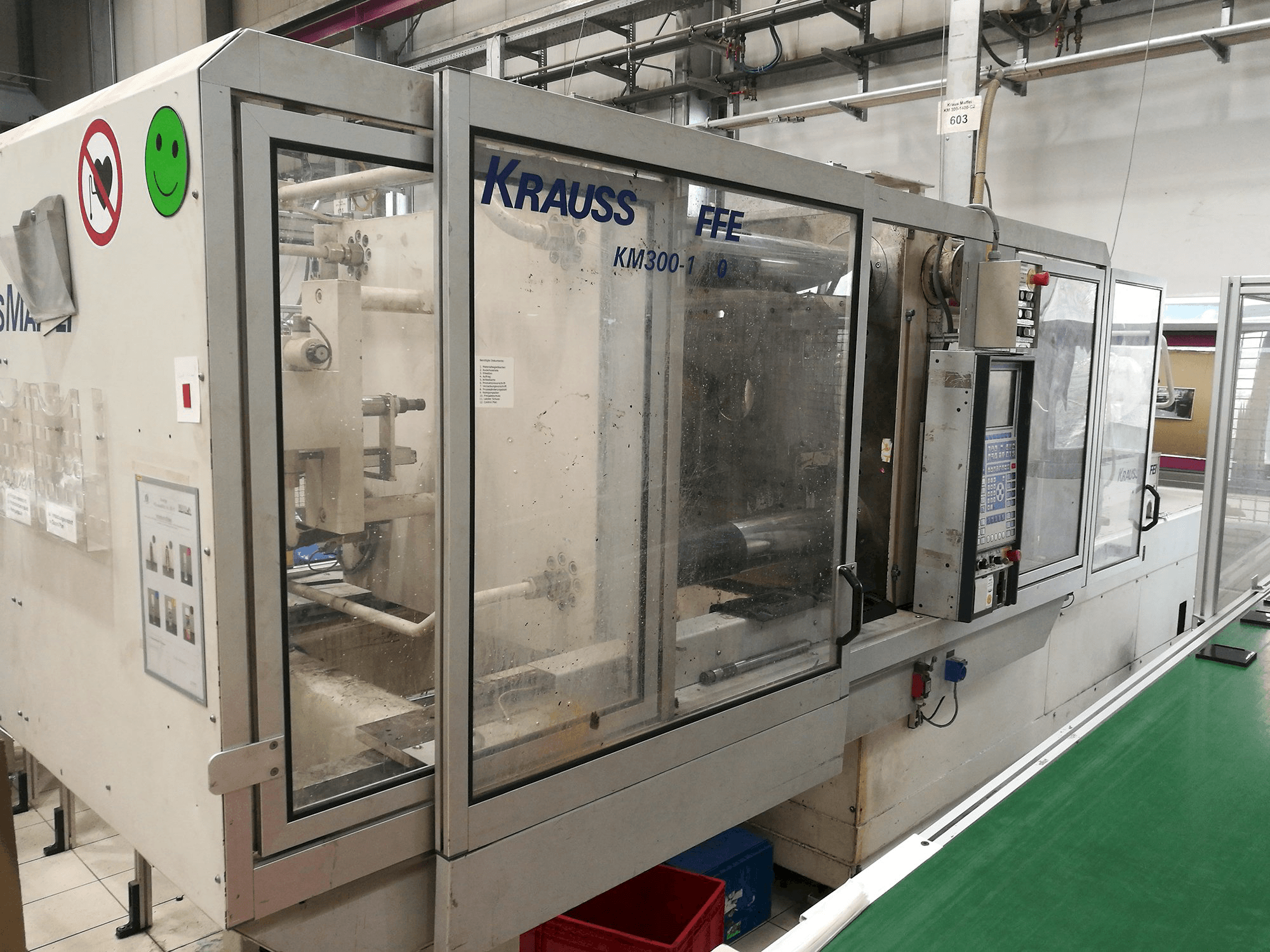 Masinavaade Krauss Maffei KM 300-1400 C2 vasakult