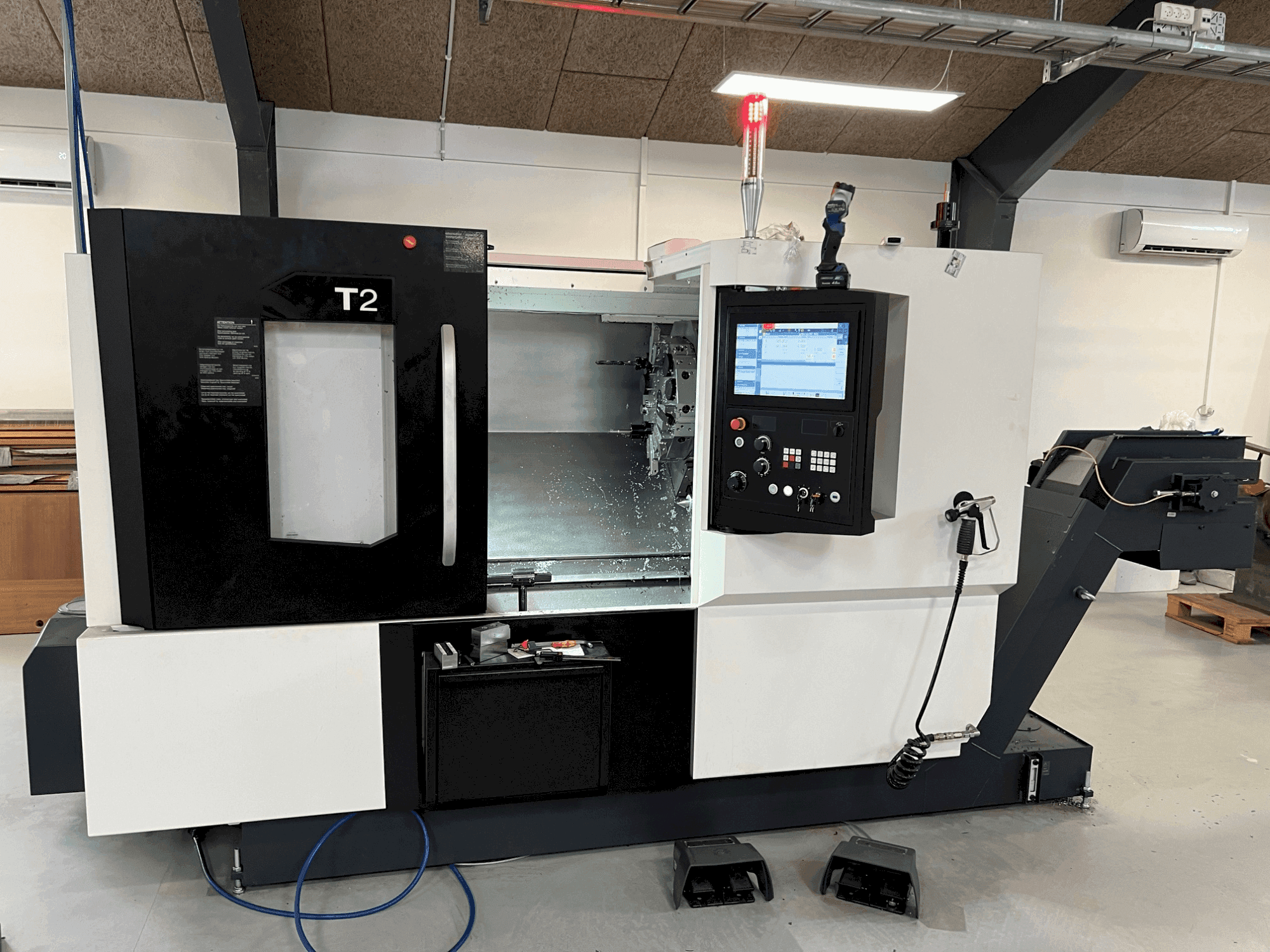 Masina DMG MORI T2 eestvaade