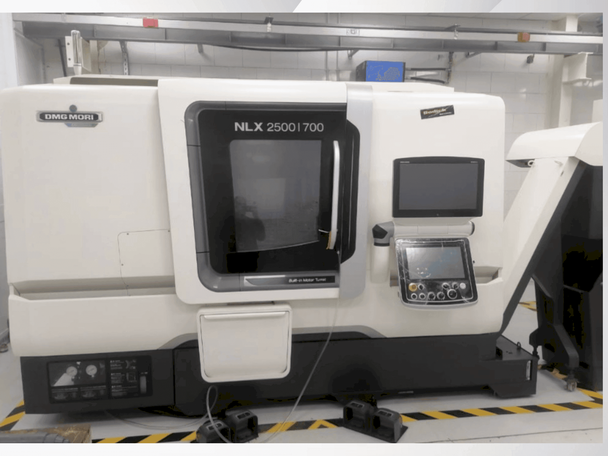 Masina DMG MORI NLX 2500/700 eestvaade