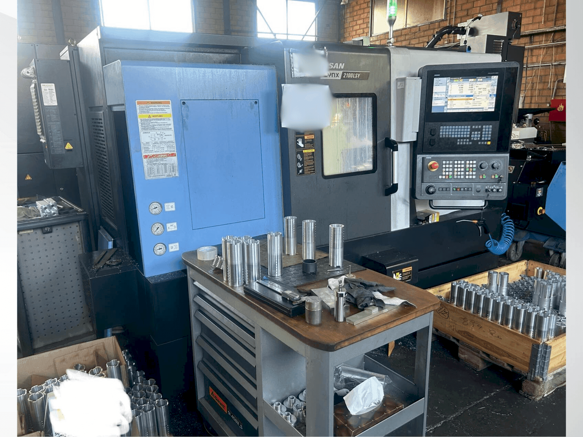 Masina DOOSAN LYNX 2100LSYA eestvaade