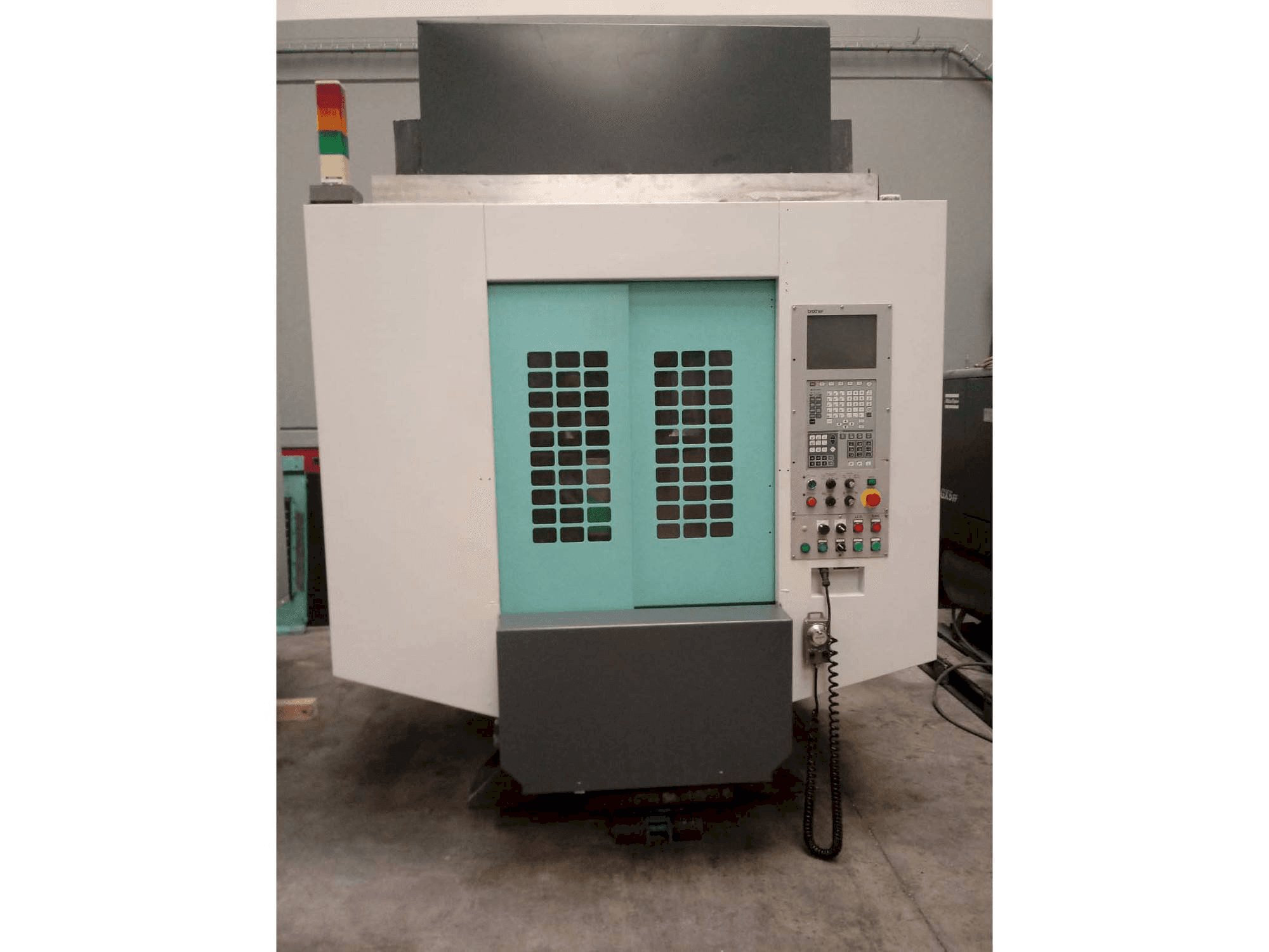 Masina Brother TC-S2DN-O eestvaade