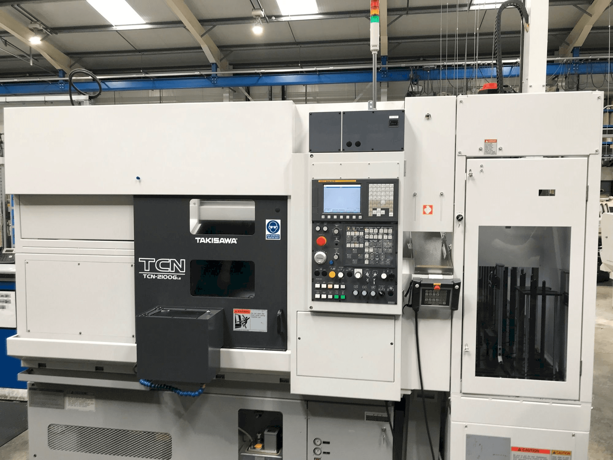 Masina Takisawa TCN-2100G L6 eestvaade