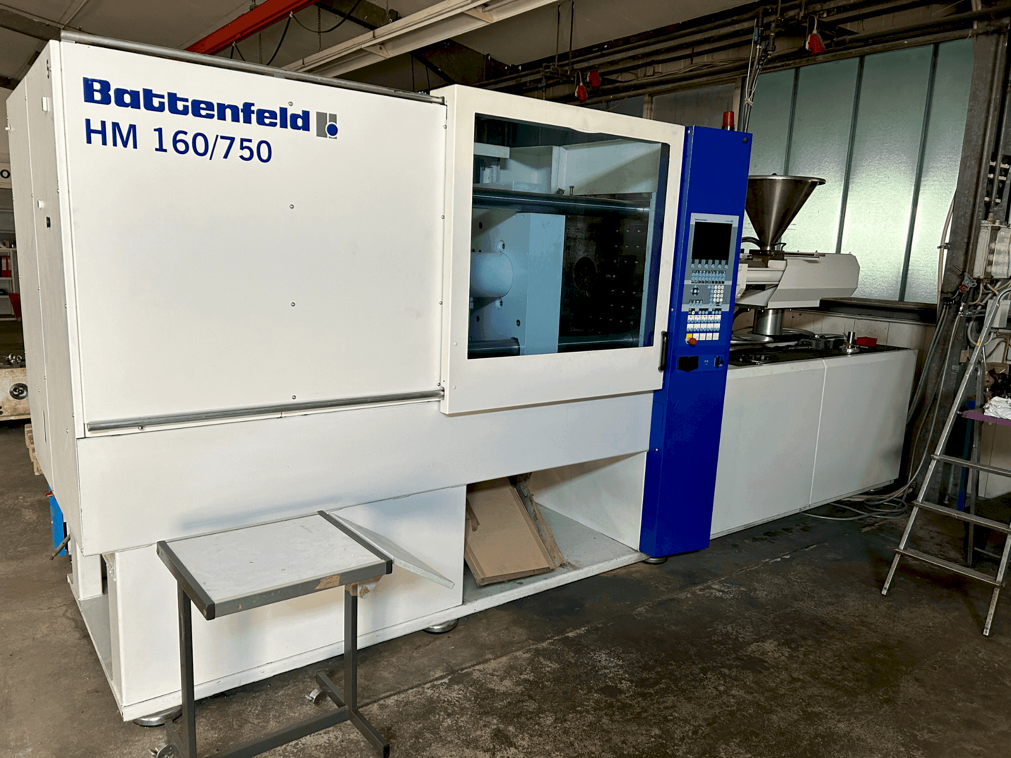 Masina Battenfeld HM160/750E eestvaade