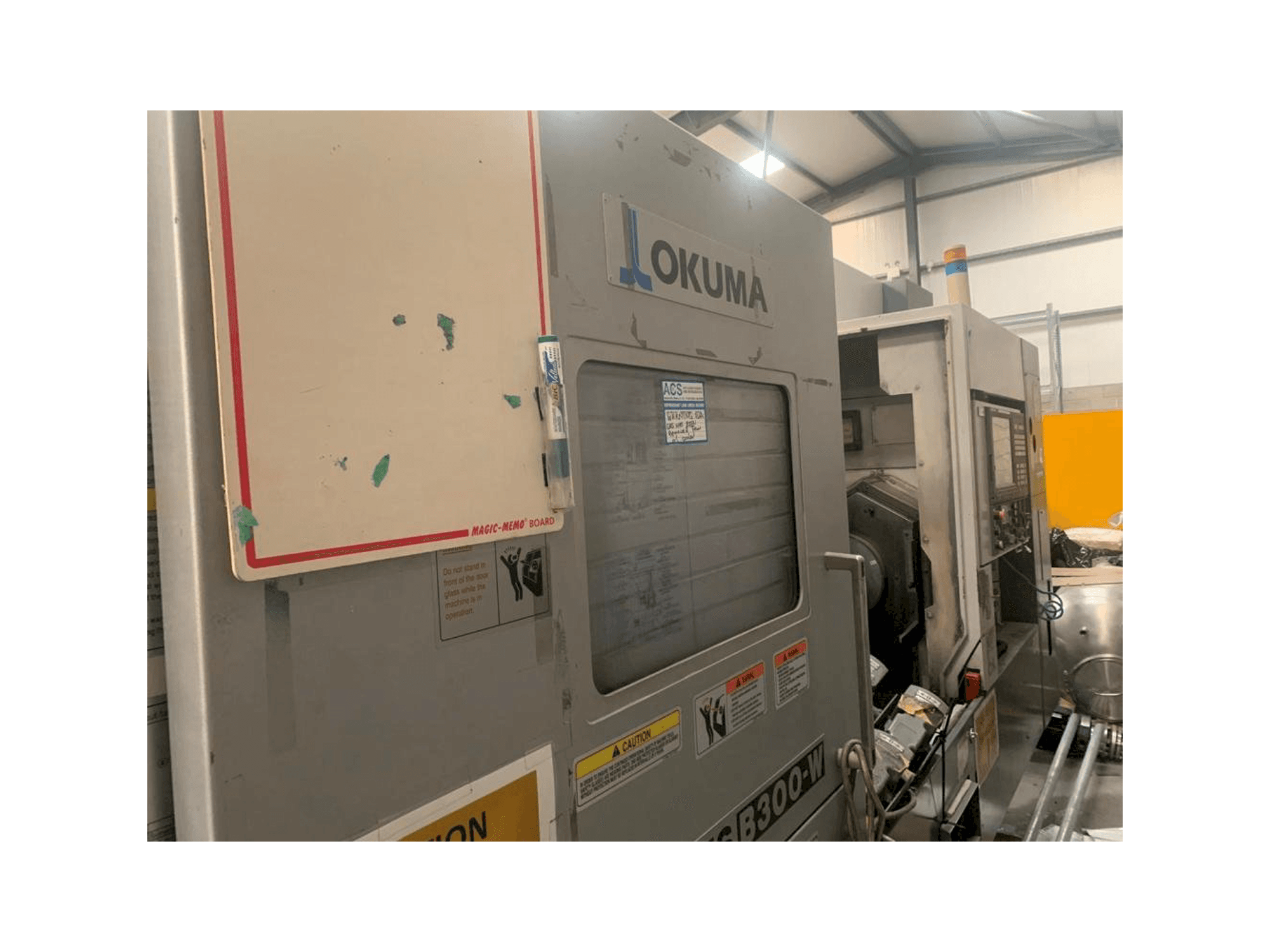 Masina Okuma Multus B-300W eestvaade