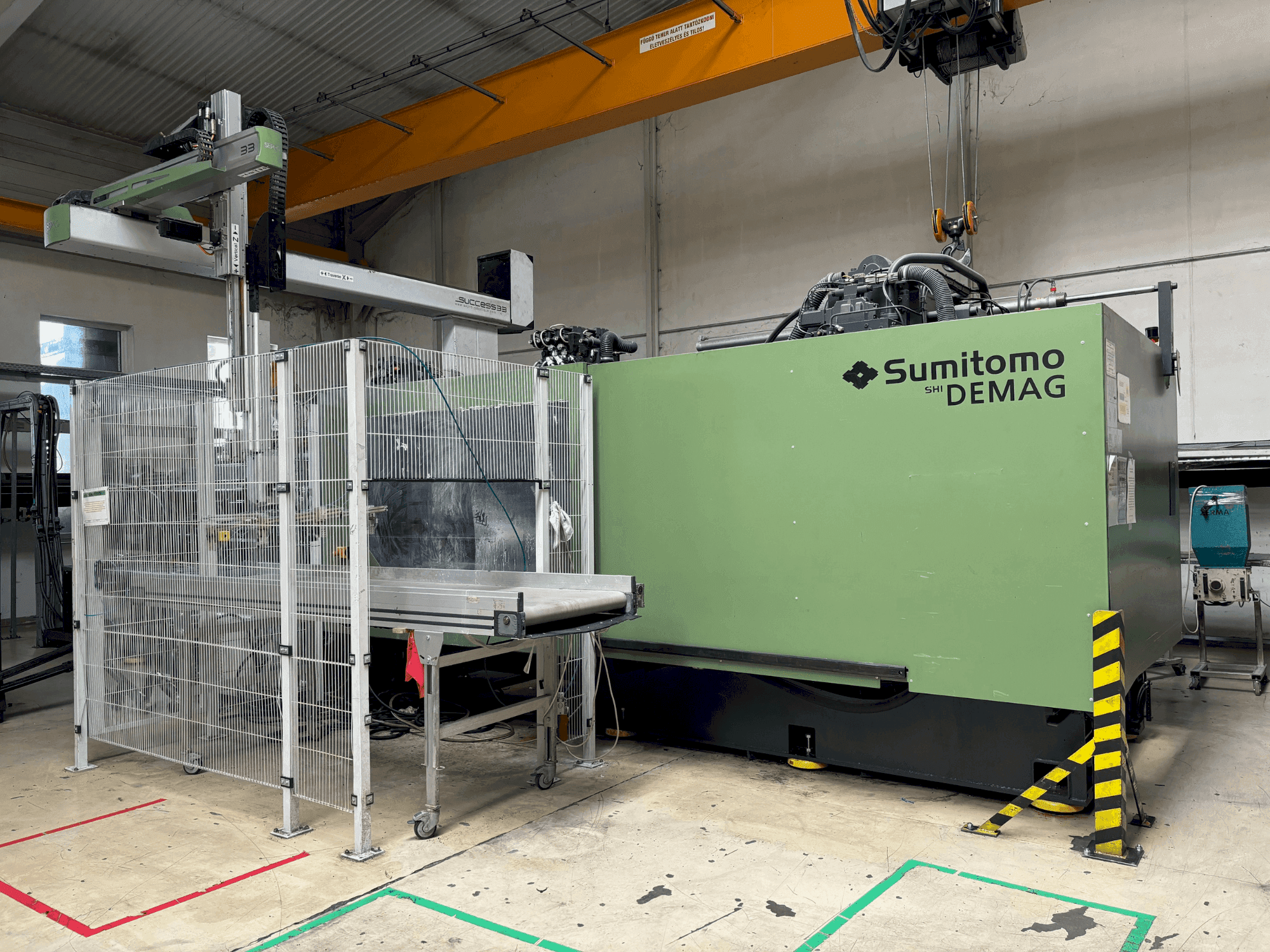 Masina SUMITOMO SHI DEMAG Systec 800/1120-6400 eestvaade